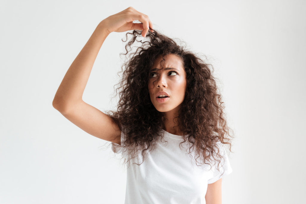 Why Your Curls Are Frizzy, Dry, and Losing Definition (And How to Fix It)